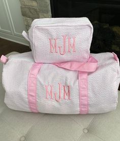 "Personalize this adorable seersucker travel set to make the perfect gift. Set options: 1. Duffle bag only 2. Toiletry bag only 3. Duffle + toiletry bag set Great for trips to grandparents, dance, sports, daycare, travel, etc. Use the added toiletry bag to hold all your toiletries, hair bows, or small toys. Great way to stay organized! Monograms are typically embroidered in first initial, LAST initial, middle initial order for girls. Some may want their monogram in first, middle, last order. Ple Toddler Diaper Bag, Monogrammed Duffle Bag, Baby Travel Bag, Ballet Bag, Pink Seersucker, Bridesmaid Bags, Baby Monogram, Barrel Bag, Dance Bag