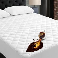 an image of a bed that has melted chocolate on it