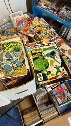 many comic books are on display in a box