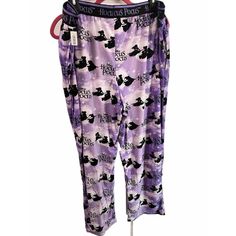 The Disney Women's Hocus Pocus Plush Sleep Pants Are A Pair Of Multicolored Lounge Pants Made Of Lightweight Velvet Polyester Material. They Feature An All-Over Print Of The Hocus Pocus Characters And Have An Elastic Waistband For A Comfortable Fit. These Pants Are Machine Washable And Come In Size Xxl. They Are Perfect For Halloween And Can Be Worn In Fall, Winter, And Spring. The Pants Are An Official Disney Product From The Plush Brand And Are New With Tags. Hocus Pocus Characters, Purple Pajamas, Women Jogger Pants, Flannel Pajama Sets, Flannel Pajamas, Sleep Pants, Bow Detail Dress, Joggers Womens, Disney Ladies