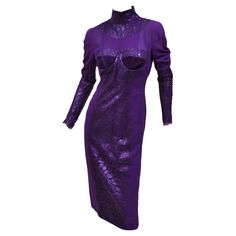 New Tom Ford Metallic Amethyst Lace Cocktail Dress It size 40 - US 4 92% Silk, 8% Elastane Fully lined, attached padded bra inside. Zipped sleeves, back zip closure. Velvet and Lace detail. Length 44", Bust 36", Waist 28", Hips 36" (fabric is stretchy). New with tags. Luxury Fitted Purple Dress, Fitted Purple Silk Dress, Tom Ford Dress, Wisteria Purple, Silk Dressing Gown, Lace Cocktail Dress, Cocktail Dress Vintage, Atelier Versace, Designer Evening Dresses