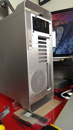 a desktop computer sitting on top of a red desk