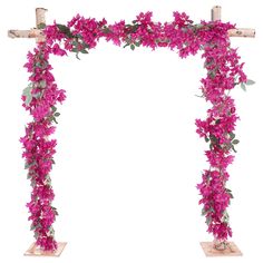 a wooden arch with pink flowers on it