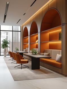 an office with orange and black furniture in it