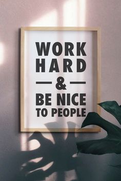 a framed poster that says work hard and be nice to people