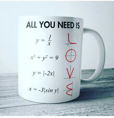 a white coffee mug with the words love written on it, all you need is love