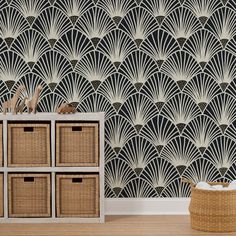 an art deco wallpaper design in black and white with wicker baskets next to it