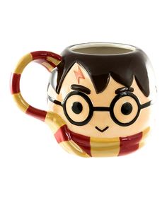 a harry potter mug with glasses on it