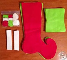 the contents of a christmas stocking laying on top of a wooden table