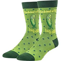 Pickle SocksUnisex pickle socks. At the top of these green socks, there are a funny saying "I'm kind of a big dill!", and a singing pickle with the eyes closed. The pickle seems to say it is a big deal.Size & PackageOur unisex design fits most men's US size 6-13 feet and most women's US size 7 and up. Each pair of funny socks comes in a plastic zippered bag.Quality MaterialOur novelty socks are made of 80% Cotton, 15% Polyamide, and 5% Elastane to ensure they are soft, comfortable, stretchy, and Thanksgiving Socks, Cool Socks For Men, Funny Socks For Men, Pickle Gifts, Punny Gifts, Food Socks, Dental Assistant Gifts, Big Dill, Pop Culture Gifts