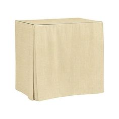 a white box with a tan cover on it