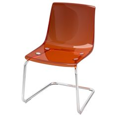 an orange plastic chair with chrome legs and a clear seat cover on the back of it