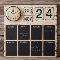 a clock and calendar on a wooden wall