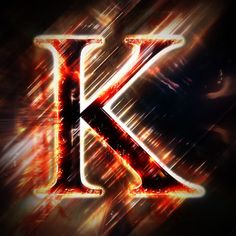 the letter k is surrounded by fire and sparks