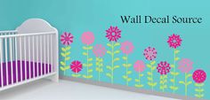 a baby's room with a wall decal that says wall decal source