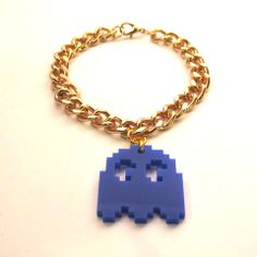 Pac Man style blue laser-cut acrylic Ghost charm, hanging from a chunky gold tone curb chain bracelet. Pac Man Ghost, Funky Jewellery, Charm Ideas, Jewellery Boutique, Blue Laser, Curb Chain Bracelet, Laser Cut Jewelry, Resin Jewellery