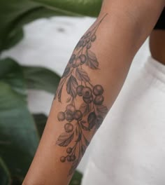 a person with a tattoo on their arm