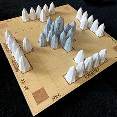 a board game with white pieces on it