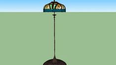 a stained glass lamp hanging from the side of a tall light pole in front of a green background