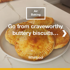 three baked pastries on a plate with the words go from craveworthy to buttery biscuits