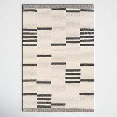 a rug with black and white stripes on it