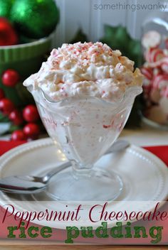 peppermint cheesecake rice pudding on a white plate with candy canes in the background