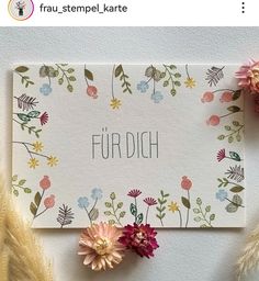 a card with some flowers on it and the words furnish written in front of it