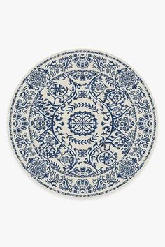 a blue and white plate on a white background