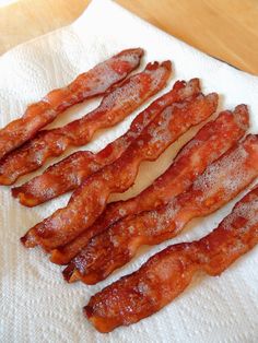 bacon strips sitting on top of a white towel