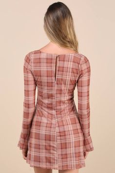 You'll be the biggest catch of the season in the Lulus Especially Adored Light Brown Plaid Long Sleeve Mini Dress! A brown plaid print adorns stretchy mesh knit as it shapes a square neckline with lacy trim and a rosette detail, all framed by long sleeves with elastic at the shoulders and flared cuffs. Fitted bodice boasts an empire waist that continues into a figure-skimming A-line skirt with a mini hem. A top loop-button closure secures atop a keyhole cutout at the back. Hidden back zipper/clasp. Fit: This garment fits true to size. Length: Mid-thigh. Size medium measures 32.25" from shoulder to hem. Bust: Great for any cup size. Waist: Fitted - stretchy fabric allows custom fit. Hip: Not Fitted - room for hips. Undergarments: May be worn with a strapless bra, adhesive bra, petals, or no Plaid Long Sleeve Mini Dress For Spring, Cheap Long Sleeve Brown Mini Dress, Long Sleeve Brown Mini Dress, Brown Fitted Plaid Dress, Brown Plaid Mini Dress, Dress With Lace Trim, Mini Dress Long Sleeve, Mesh Mini Dress, Adhesive Bra