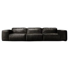 a black leather couch with three reclinings on the back and one arm extended