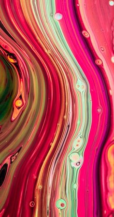 an abstract painting that looks like it has been painted pink, green and yellow with water droplets