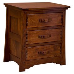 a small wooden chest with three drawers