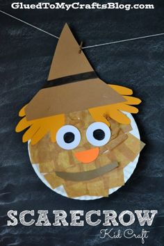 paper plate scarecrow craft for kids on a chalkboard with the words scarecrow cut out