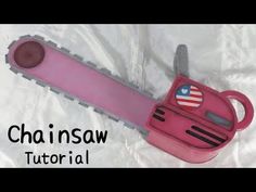 a pink plastic toy with an american flag on it's back and the words, chainsaw