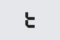 the letter t is made up of two black letters on a light gray background,