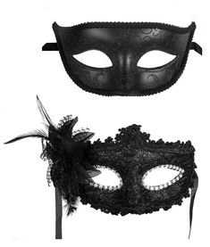 two black masquerades with feathers on them