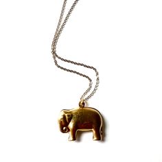 They say an elephant never forgets, so this gem is a toast to always remembering! Made in 3d from a vintage mold, this hollow brass pendant suspends from gilt brass chain for a lovely souvenir of a necklace. Measures 16" length with spring ring clasp, elephant measures approximately 1" wide. Elephants Never Forget, Brass Elephant, Best Gift Cards, Elephant Necklace, Luck Charm, An Elephant, Brass Charms, Luck Charms, Brass Pendant