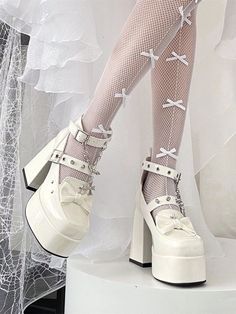 This price is for a pair of shoes only, others are not included. Fabric:PUShoes Details:Bow at Top / Buckle Ankle Strap / Buckle Strap / High Block Heel / Polished / Silver-tone Studs / Silver-toned Grommet Studs Size 35 36 37 38 39 40 Foot Length 22.5 23 23.5 24 24.5 25 Heel 4-12 4-12 4-12 4-12 4-12 4-12 Reference Photos For Drawing, White Platforms, Block High Heels, Coquette Outfits, White Goth, Punk Shoes, Goth Shoes, Kawaii Outfit, Kawaii Vintage