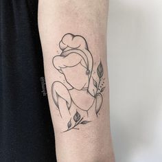 a woman's arm with a tattoo on it