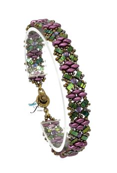 a bracelet with beads and charms on it