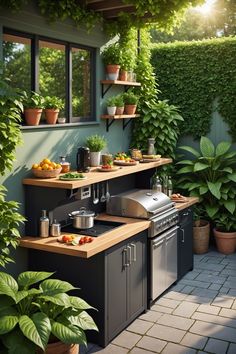 an outdoor kitchen with potted plants and pots