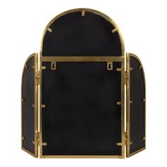 a black and gold wall mirror with an arched window in the middle, on a white background