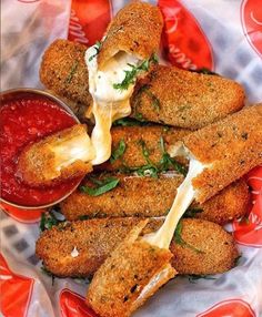 some fried food is on a plate with sauce