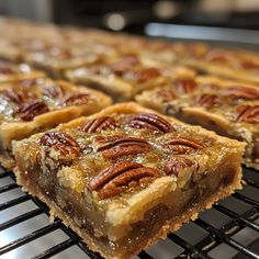 several pecan pies cooling on the grill