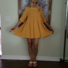 Nwt Golden Sunflower Yellow Babydoll Dress Purchased From Small Boutique In Southern California Color Looks Much Better In Real Life, More Vibrant Golden Mustard Last 3 Photos Shows True Color The Best Raw Hemline, Keyhole Button Closure On Back Super Comfortable Relaxed Fit, Nice Cool Lightweight Material! Perfect For Summer This Will Fit A Medium As Well Great Fall Color Dress Yellow Summer Spring Dress Autumn Dress Yellow Sundress Casual Relaxed Dress Sunny Dress Girly Dress Mustard Yellow Dr Cute Yellow Mini Dress For Spring, Cute Yellow Spring Mini Dress, Cute Yellow Mini Sundress, Yellow Flowy Short Sleeve Dress, Yellow Short Sleeve Sundress For Summer, Yellow Short Sleeve Dress For Daytime, Cute Yellow Dress For Day Out, Mustard Mini Dresses For Day Out, Cute Yellow Mini Dress For Vacation