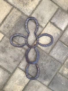 a pair of scissors laying on the ground