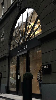 the entrance to gucci store in new york city