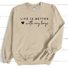 Life Is Better With My Boys Sweatshirt, Boy Mom, Mom Shirt, Mom Life, Mother's Day Gift Ideas, Boy Mom Sweatshirt These sweatshirts & shirts make the perfect gifts! * Please view pictures for sizing and style guides. How To Order: 1. Read and go over all information in the listing and pictures. 2. Select the color and size you would like from the drop down menu. If you don't see a color or size please reach out and we may be able to special order your selection.  3. Type any custom text required Boy Mom Sweater, Boy Mama Shirts, Boy Mom Cricut Shirts, Mom Life Sweatshirt, Boy Mom Sweatshirt, Boy Mom Sweatshirts & Hoodies, Mom Of Boys Shirt, Boys Sweatshirts, View Pictures