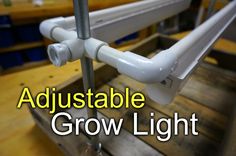 the adjustable grow light is attached to a wooden crate with text that reads, adjustable grow light